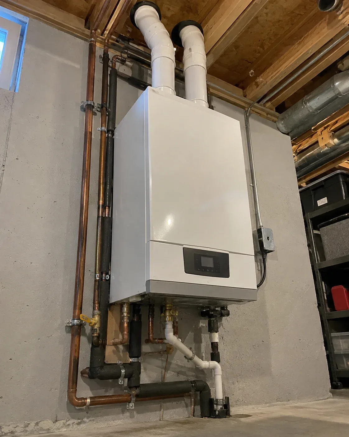High-efficiency wall-mounted condensing gas boiler in an Ottawa residence